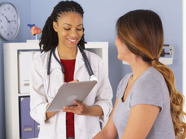 Doctor asking patient questions Doctor asking patient questions