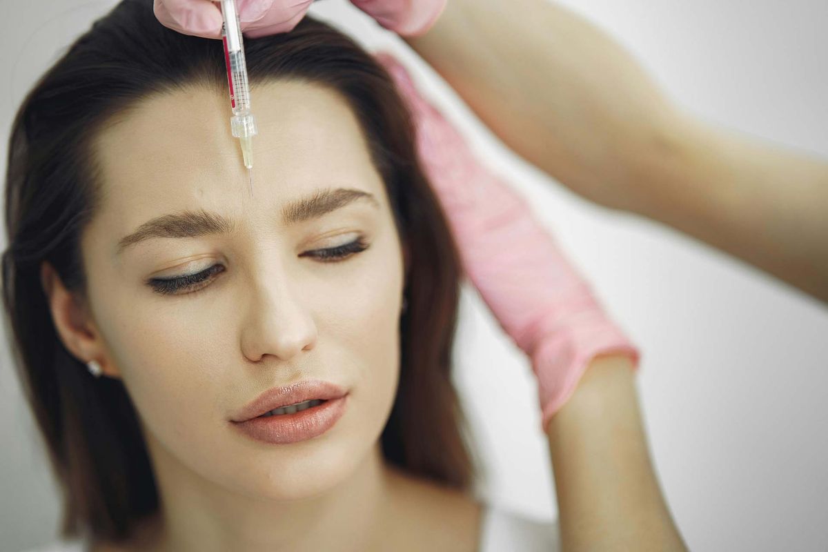 a woman receiving botox