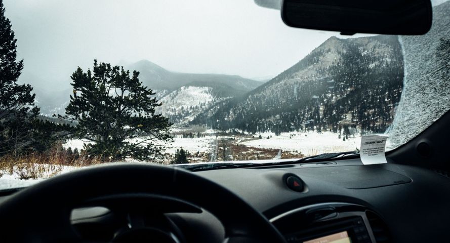 driver's view of driving in Colorado mountains in the winter Why Suspension Geometry is the Key to Winter Safety Hero.jpg