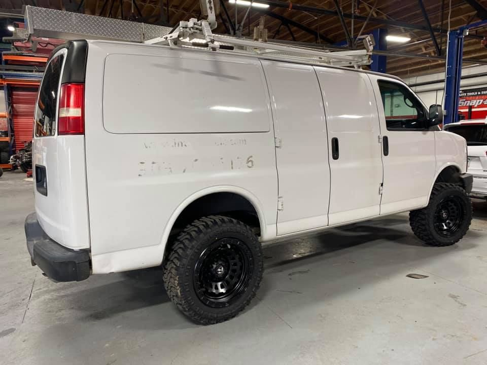 white work van with new tires