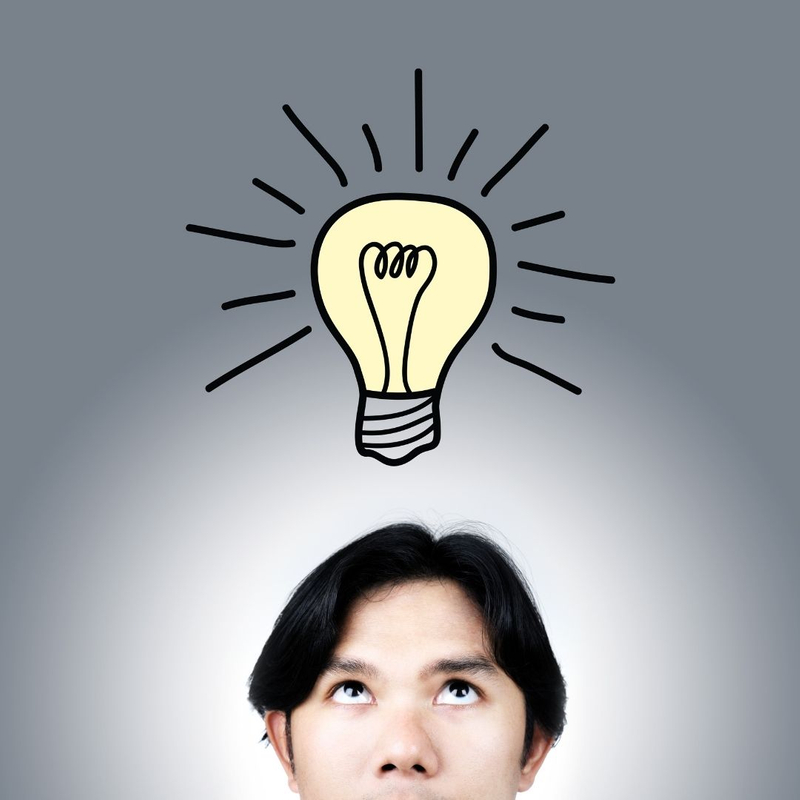 person with an animated light bulb over their head