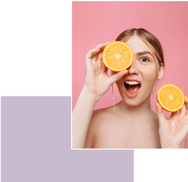 Woman holding orange slices