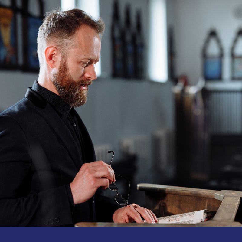 preacher at a pulpit
