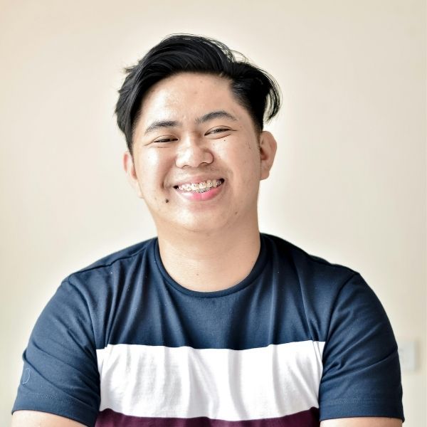 Man wearing clear braces.