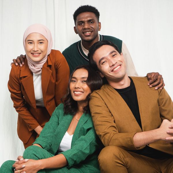 A group of smiling people. A group of smiling people.