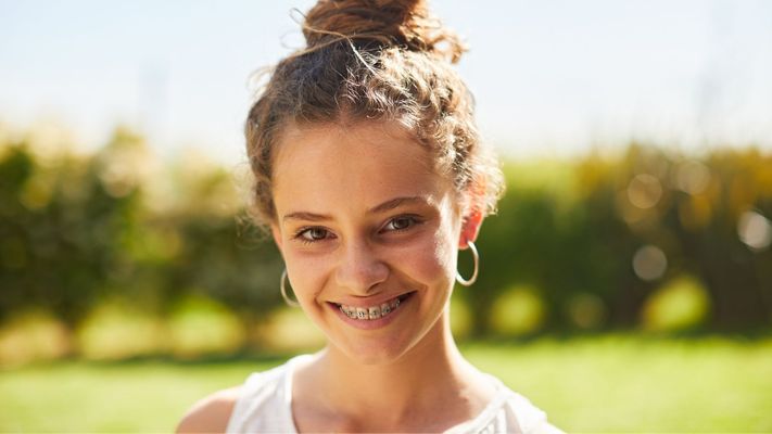 smiling girl with braces
