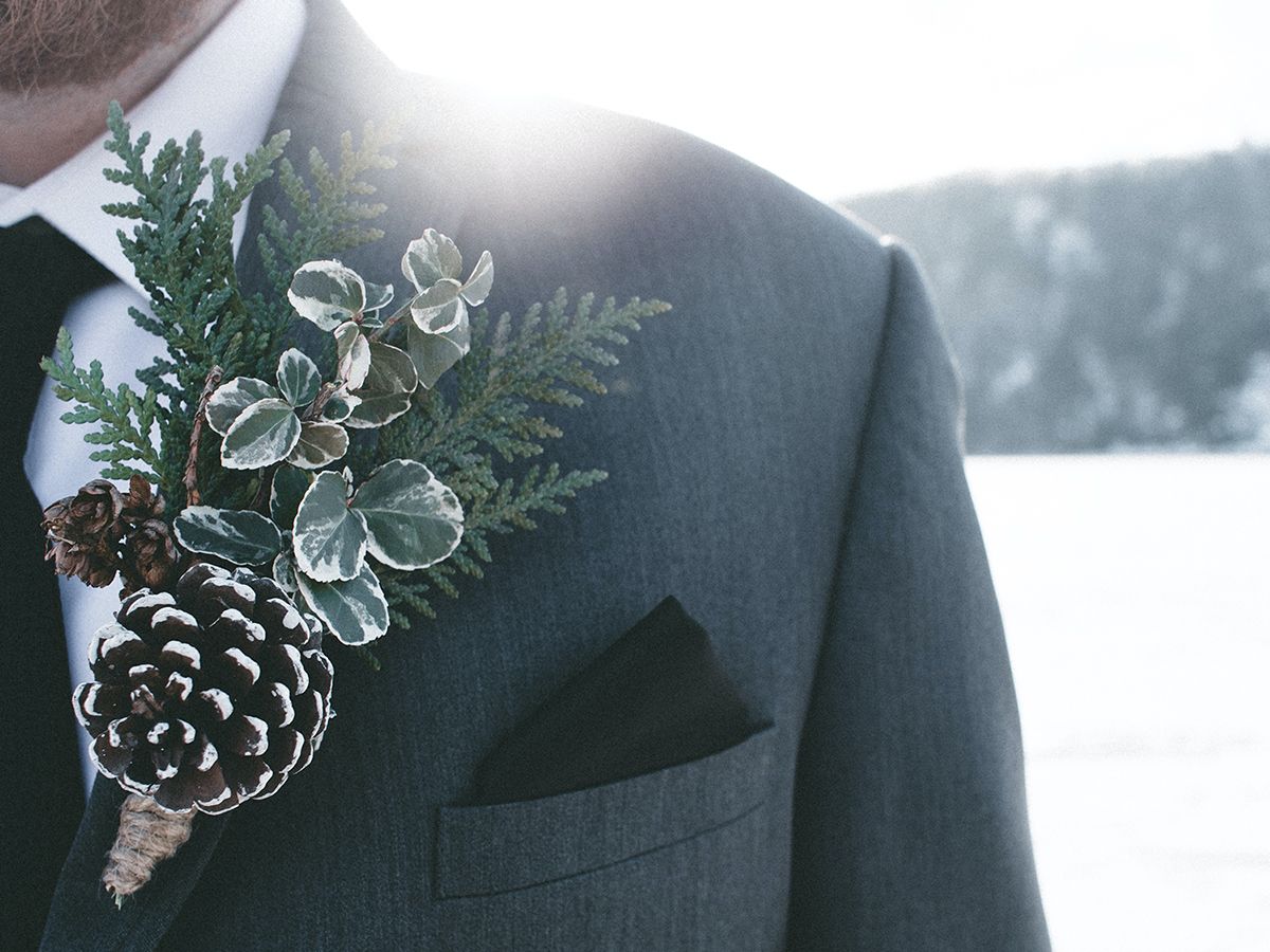 men with pinecone boutonniere