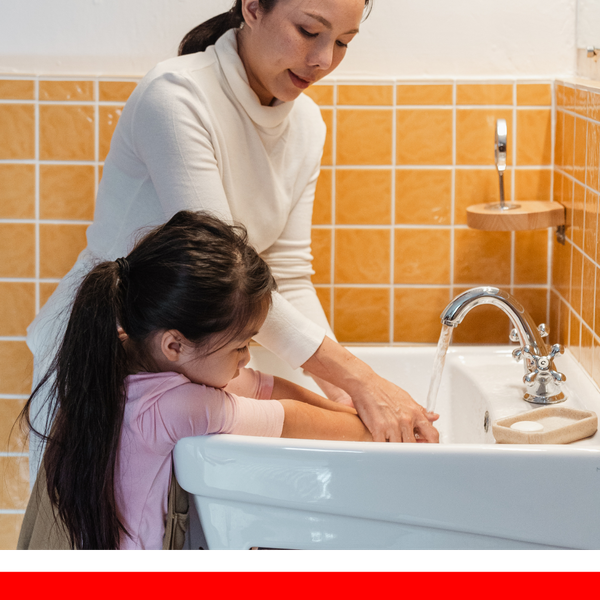 mother and child washing hands