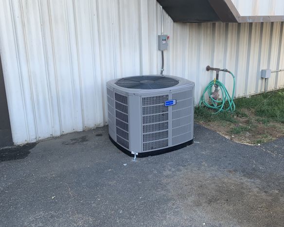 ac install at riverside flight academy ac condenser installed at the riverside air port-min.jpg