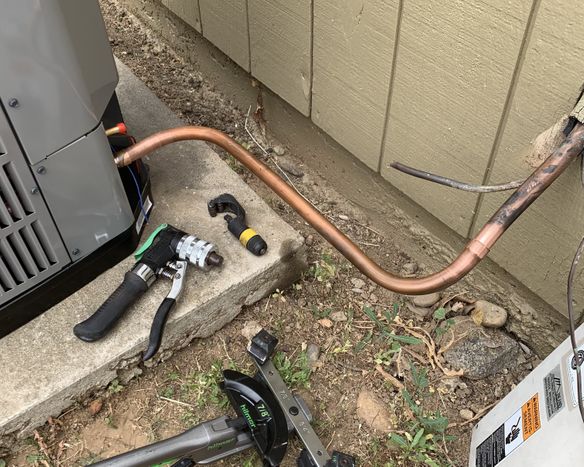 retrofitting copper for new ac bending lineset for new ac install in riverside-min.jpg