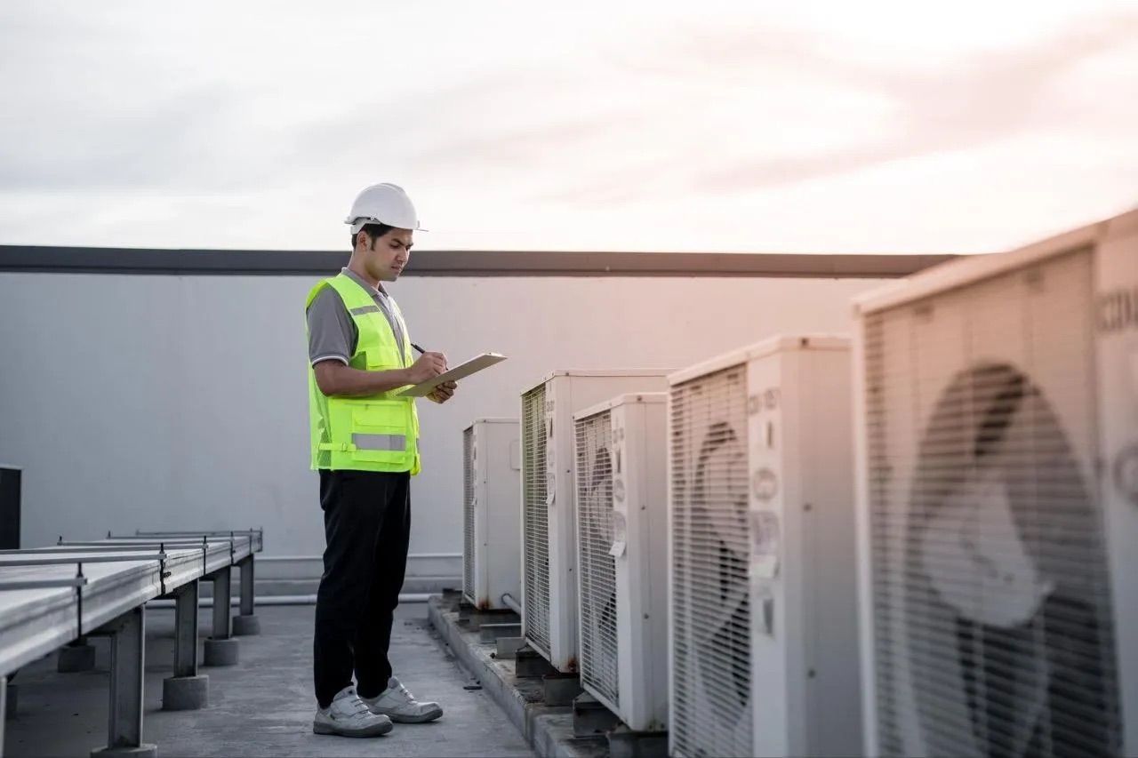 A person checking workplace air quality 