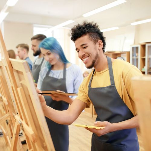 Co-workers in a painting class