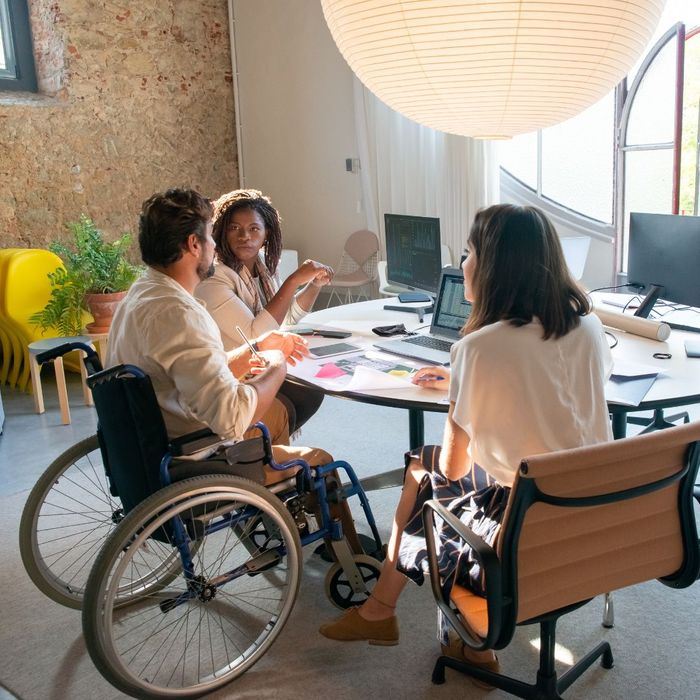 corporate meeting, man in wheelchair, inclusivity corporate meeting, man in wheelchair, inclusivity
