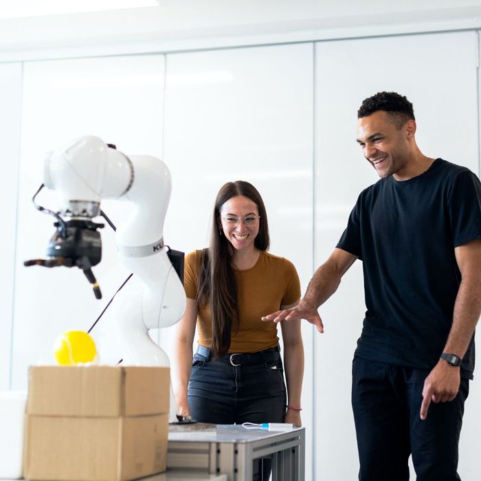 engineers demonstrating robotics engineers demonstrating robotics