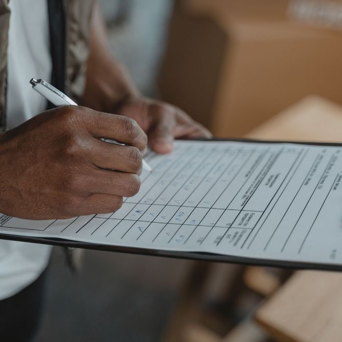 person filling out a survey person filling out a survey