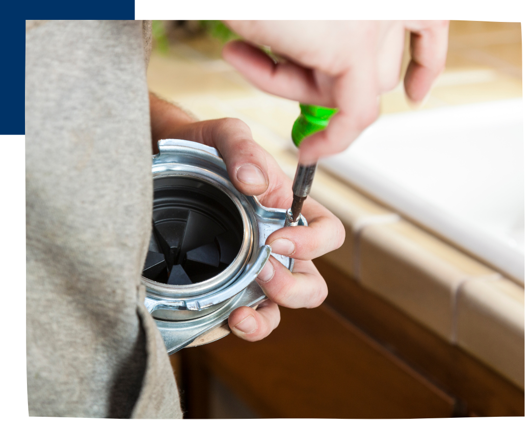 man fixing garbage disposal sink cover