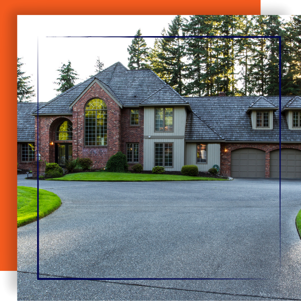 Freshly pressure washed residential driveway.