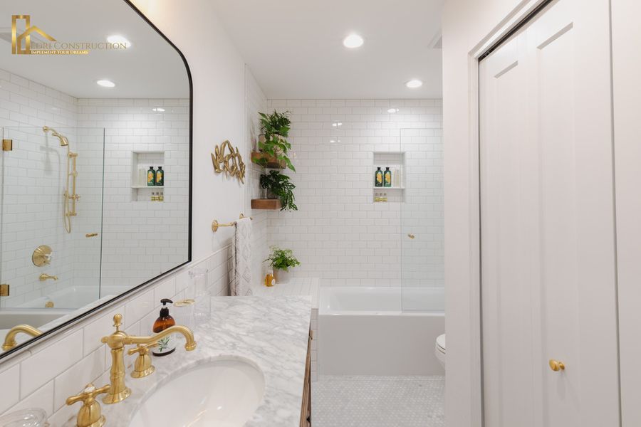 remodeled bathroom with gold fixtures