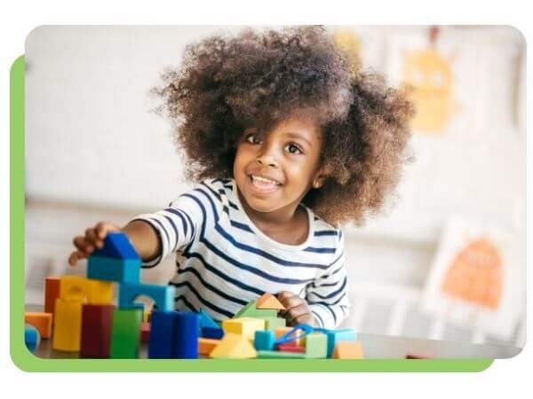 toddler playing with blocks