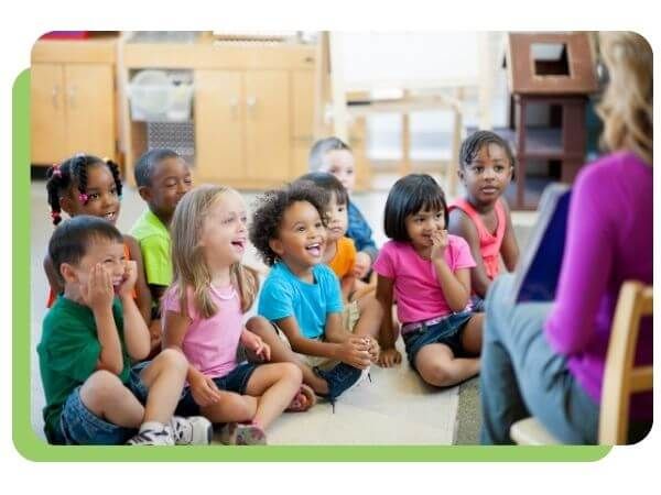 preschoolers sitting on the floor during story time