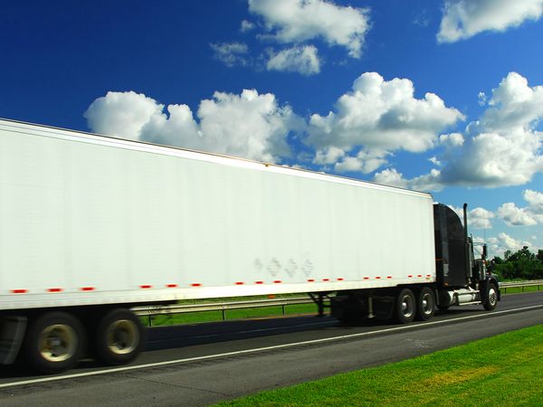 Fast moving truck on highway