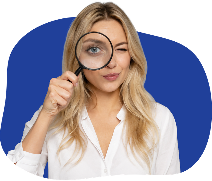 woman holding up magnifying glasses.png
