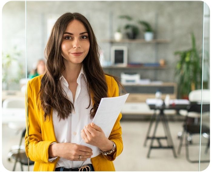 Professionally dressed person smiling