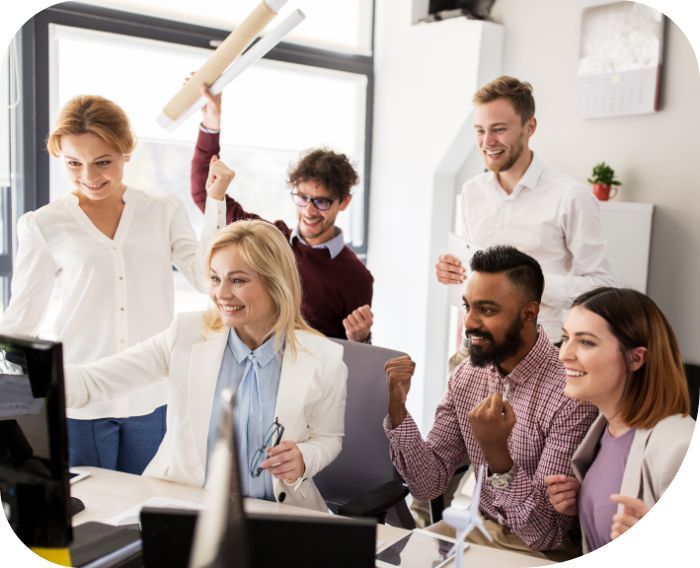an excited group of workers