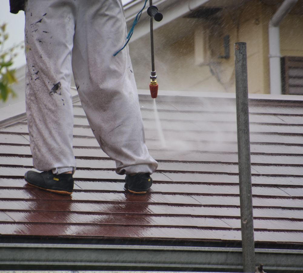 a roof being soft washed