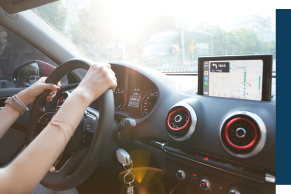 behind the wheel of a vehicle