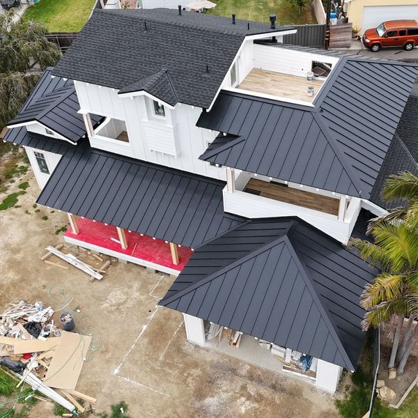 drone view of standing seam metal roof drone view of standing seam metal roof