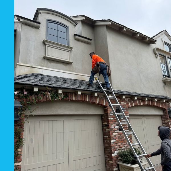 Precision team working on residential roof