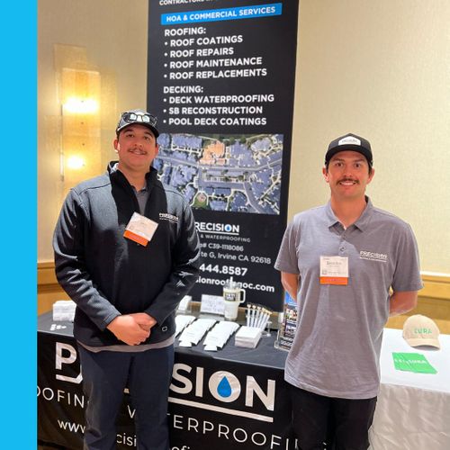 Precision Roofing team at trade show