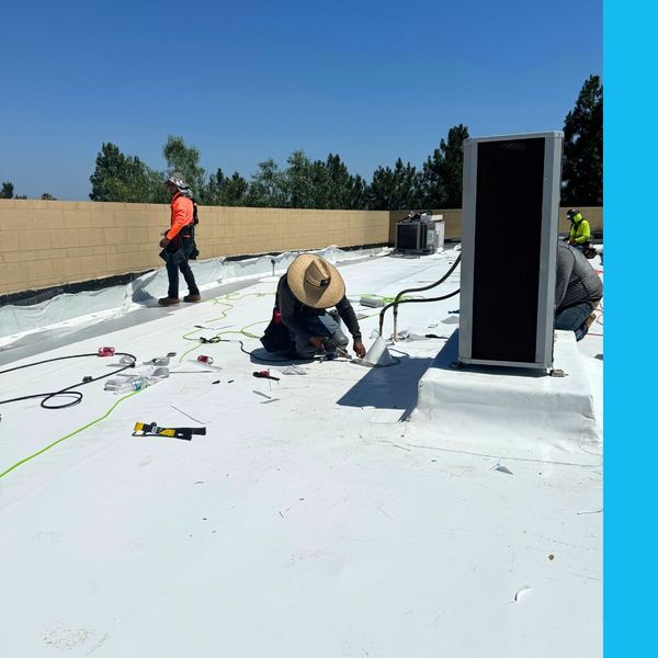 Precision team working on commercial roof