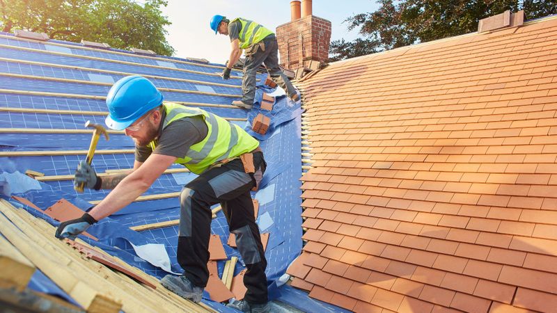 roofers working on roof