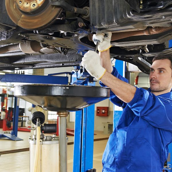 mechanic working on car