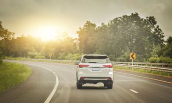 vehicle driving down the road