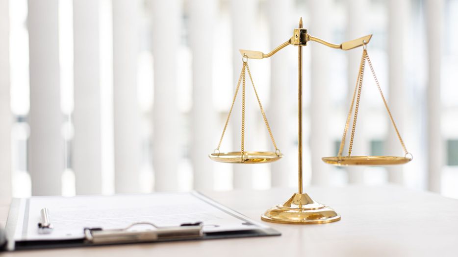 image of two legal scales symbolizing justice