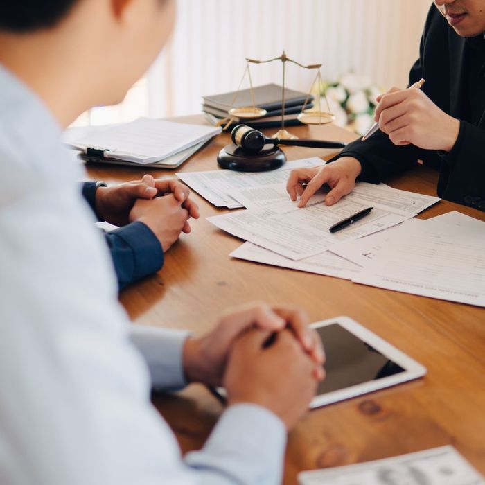 table with paperwork and pen