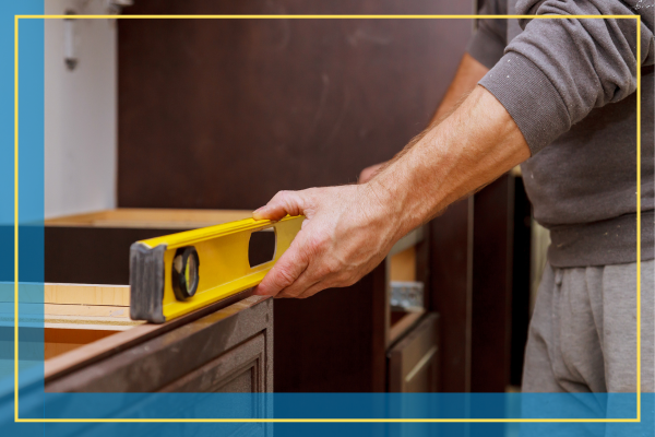 man installing countertops.