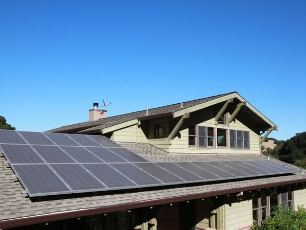 An image of solar panels on a roof.