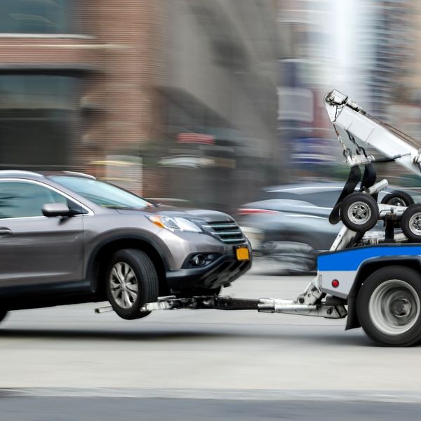a car being towed in a city 4 Signs You Need Professional Towing (4).jpg