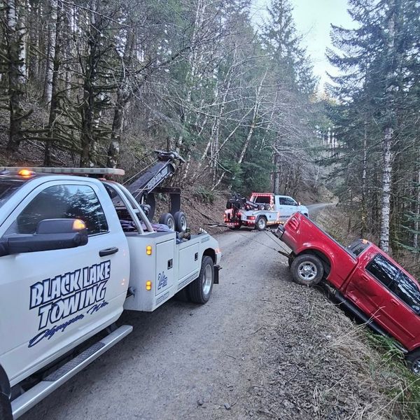 pickup in ditch needing towing