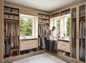 A couple in a luxurious custom walk-in closet