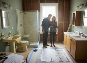 Couple planning bathroom renovation