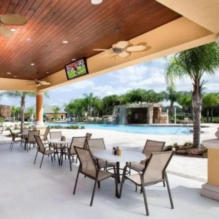 resort pool deck with tv