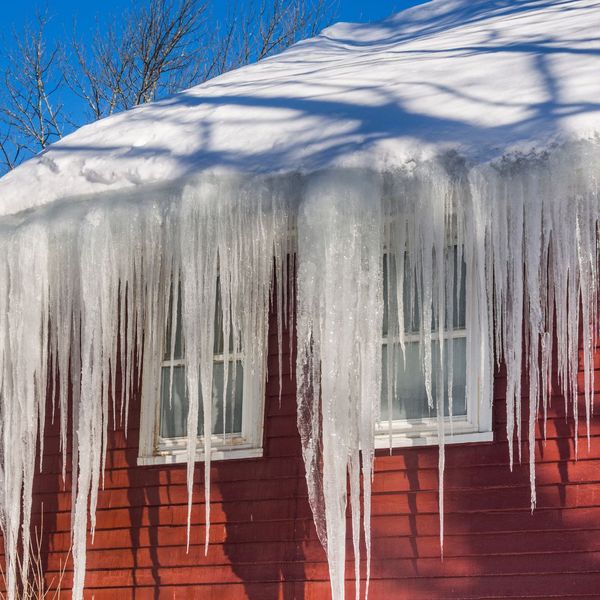 Roof with ice dams after a winter storm