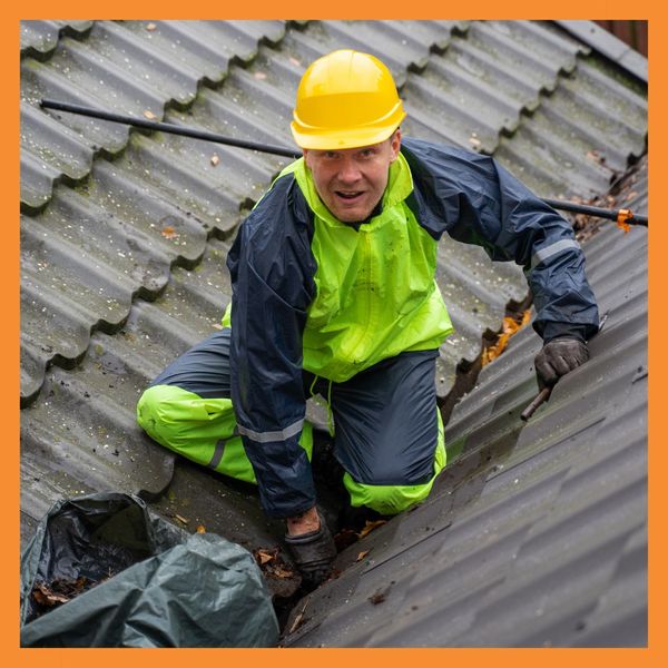 roofer inspecting shingles