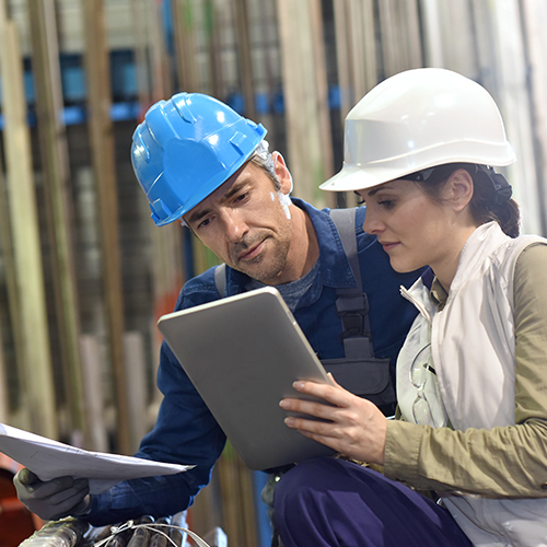 Workers checking their tablet