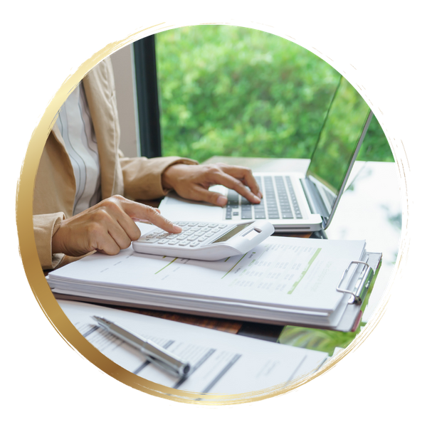 accountant working on calculator and computer